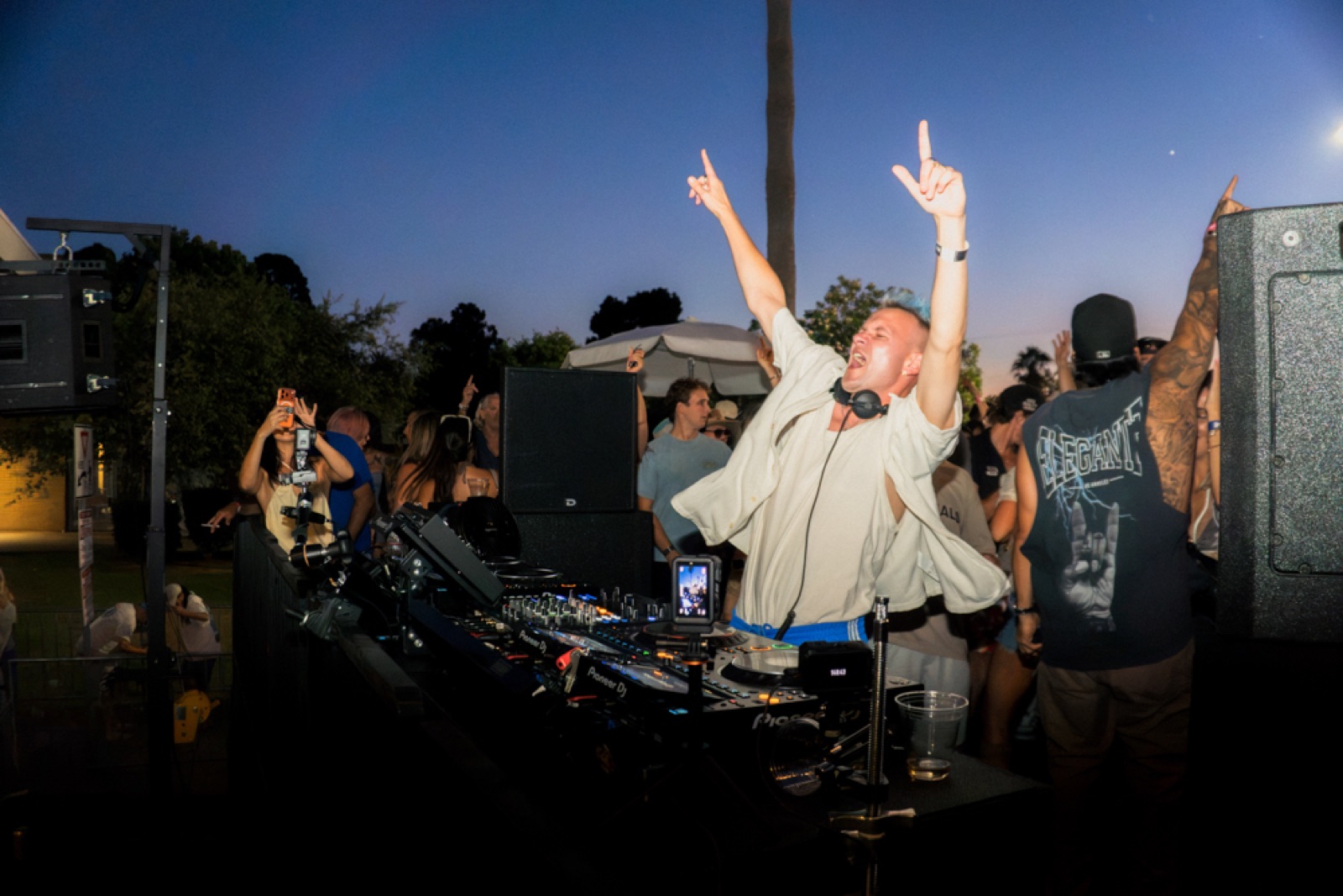 Hands up at the decks as the sun drops