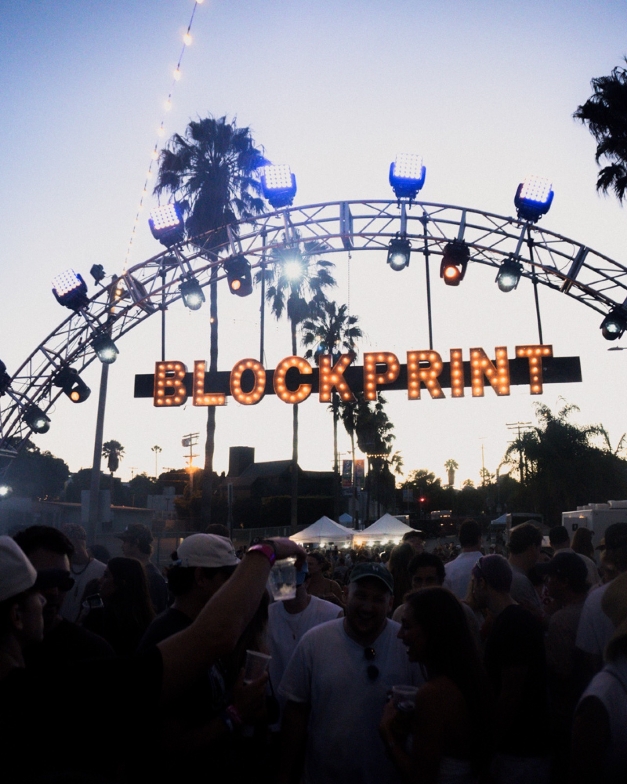 The Blockprint truss arch against the dusk sky